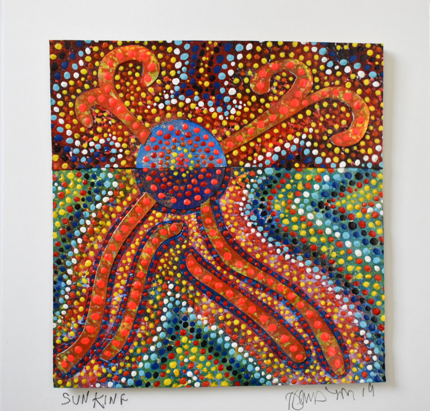 abstract painting with a burst of orange rays emerging from a blue dot.