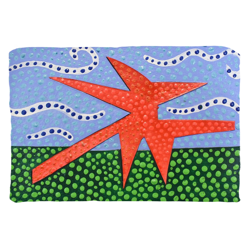 modern lawn art minimalist design inspired by alexander calder on a rectangular pillow case in red, blue, and green.