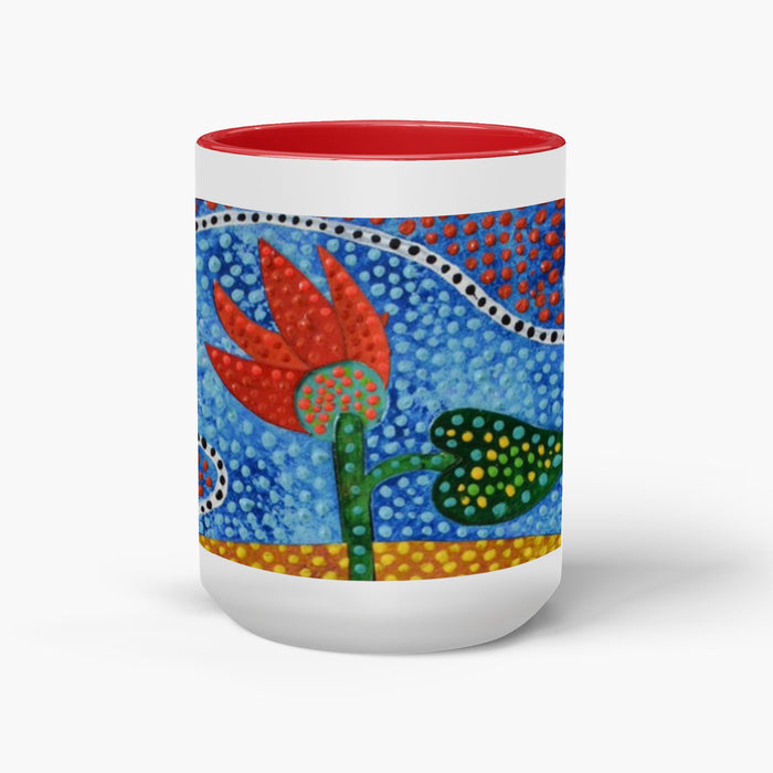 floral design on a coffee mug with red accents.